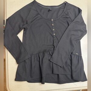 Kensie Black waffle knit penlum  Top with ruffle on the bottom.  Size large EUC